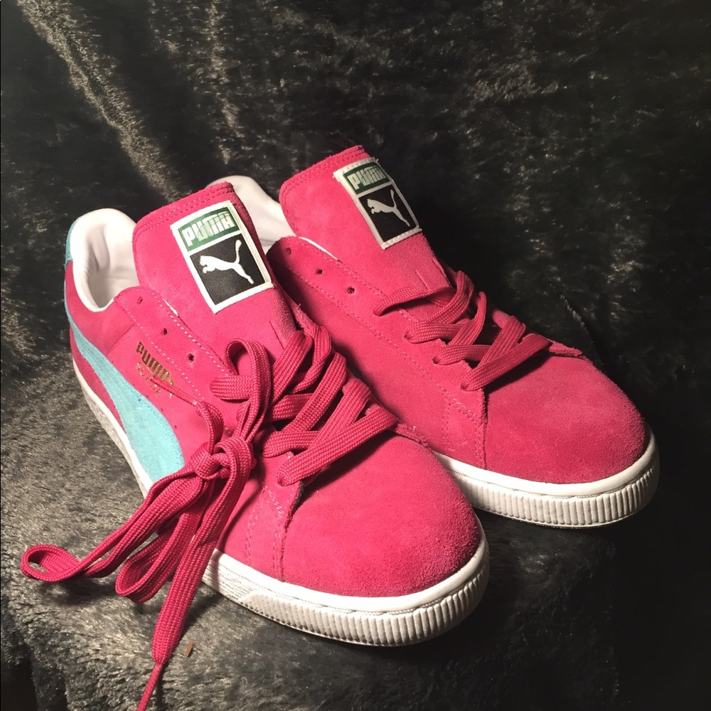 Pink and baby blue pumas